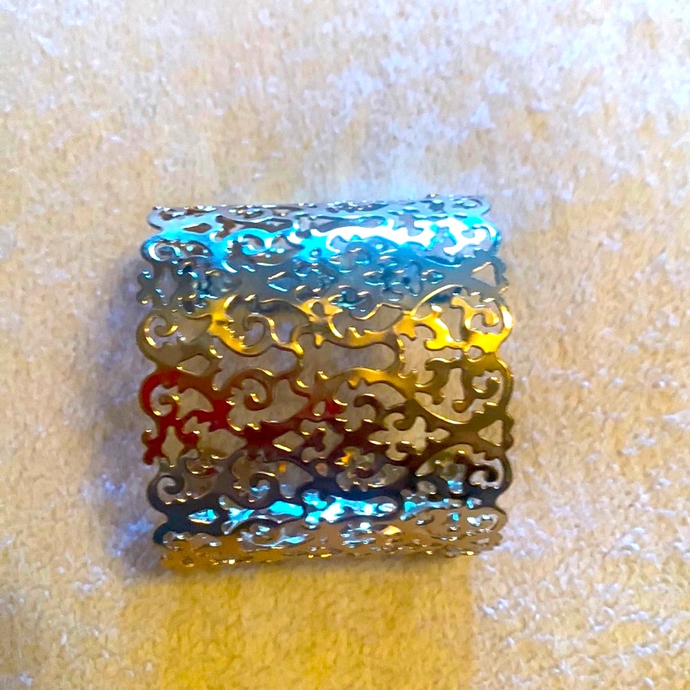 Gold tone wide cuff bracelet